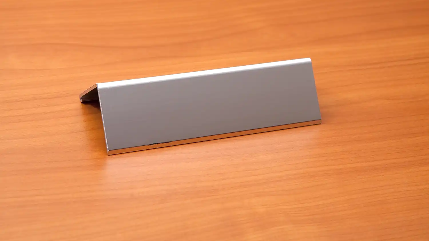 AdobeStock_18612564 Blank Name Plate